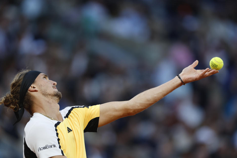 Germany's Alexander Zverev serves against Australia's Alex De Minaur during their quarterfinal match of the French Open tennis tournament at the Roland Garros stadium in Paris, Wednesday, June 5, 2024. (AP Photo/Aurelien Morissard)