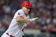 Los Angeles Angels' Mike Trout runs on the way to a double during the fifth inning of the team's baseball game against the Texas Rangers in Anaheim, Calif., Friday, Sept. 30, 2022. (AP Photo/Alex Gallardo)