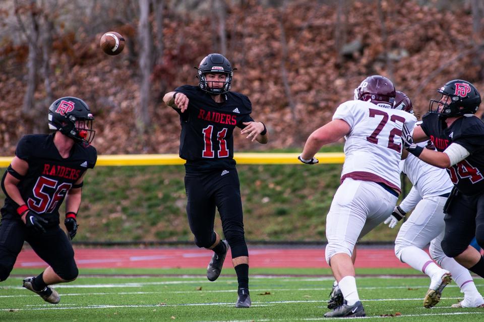 Port Jervis quarterback Logan Morris throws a pass during the Section 9 class B football championship football game at James I O'Neill High School in Highland Falls, NY on Friday, November 11, 2022. Port Jervis defeated New Paltz 34-7.