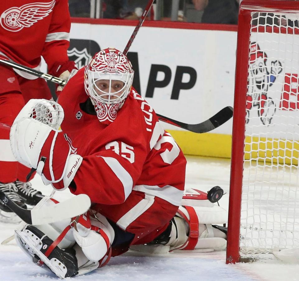 Red Wings goaltender Ville Husso gives up a goal to Maple Leafs defenseman Rasmus Sandin during the second period on Thursday, Jan. 12, 2023, at Little Caesars Arena.