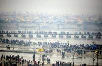 <p>Indian Hindu devotees gather on the bank of River Ganges to take a holy dip to mark “Mauni Amavasya” during the annual Magh Mela festival in Allahabad on February 8, 2016. </p>