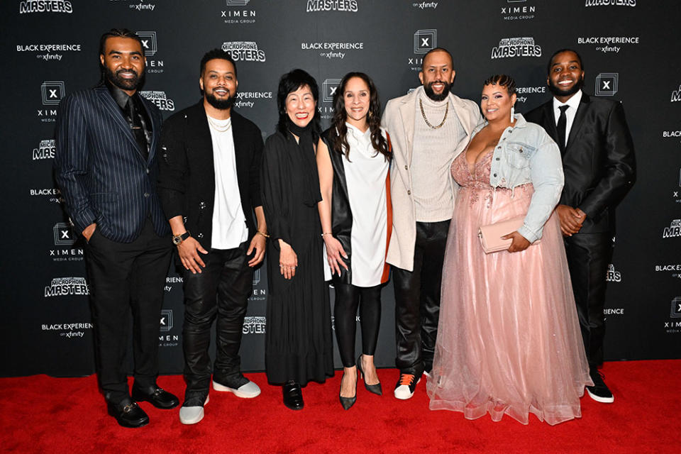 (L-R) Producer Delmar Washington (Ximen Media), comedian Ron G., director, Impact & Inclusion at Xfinity Caroline Kim, SVP and chief diversity officer of Comcast Cable Loren Hudson, comedian and producer Affion Crockett, comedian Kanisha Buss, and comedian Brandon Lewis at the Black Experience on Xfinity red carpet world premiere event of Affion Crockett Presents: Microphone Masters in Los Angeles on March 20, 2024.