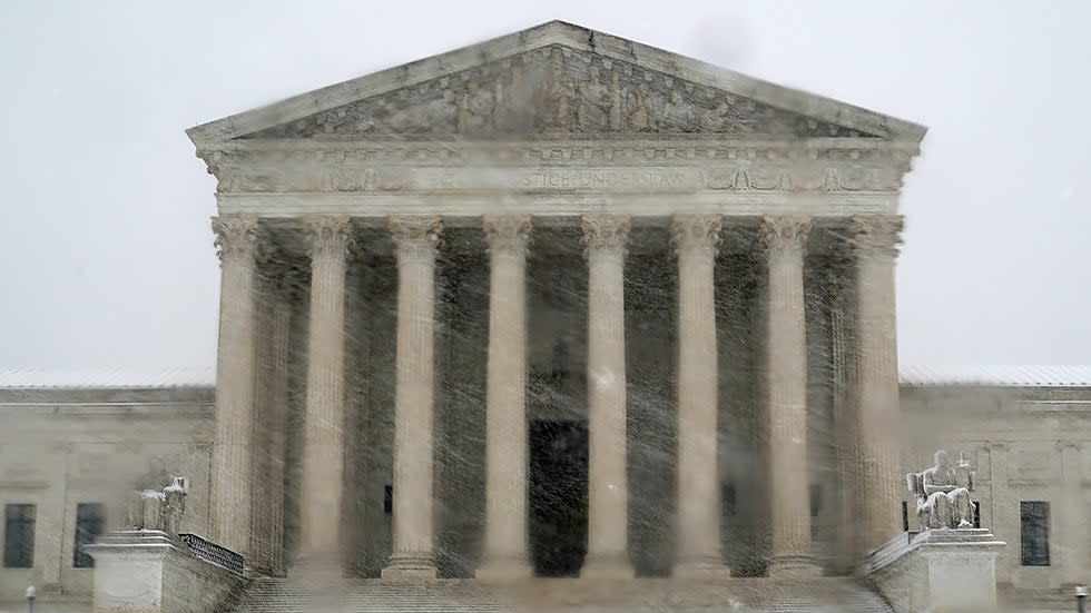 The Supreme Court is seen during a snow storm on Monday, January 3, 2022. The Washington, D.C., area is forecasted to receive five to six inches of snow before the afternoon.