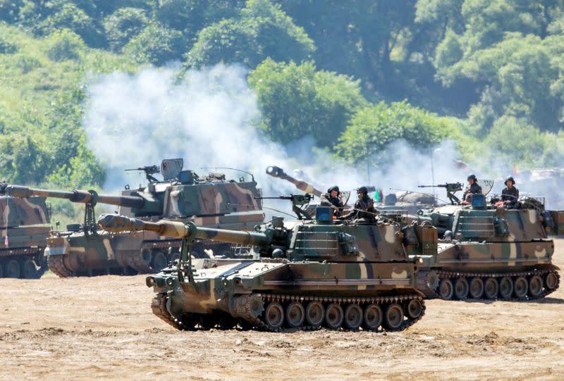 South Korean soldiers take part in a live fire exercise near the demilitarized zone separating the two Koreas in Paju