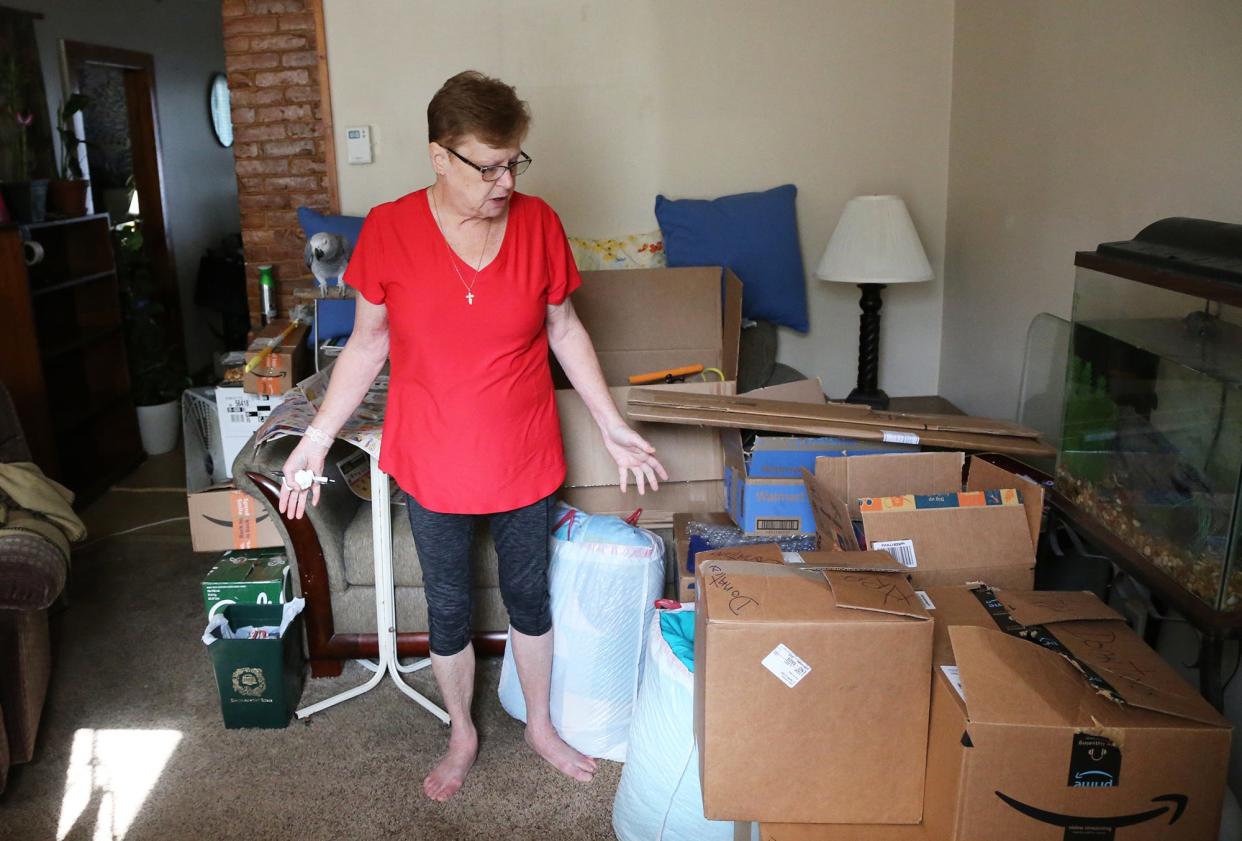 Dover resident Mary Cameron is seen packing her things  Tuesday, Sept. 14, 2021, in her apartment, but she has been unable to find a new home that will accept her Housing Choice Voucher as payment.