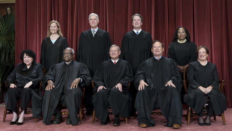 Members of the Supreme Court sit for a new group portrait at the Supreme Court building in Washington on Oct. 7, 2022. Bottom row, from left, Justice Sonia Sotomayor, Justice Clarence Thomas, Chief Justice John Roberts, Justice Samuel Alito, and Justice Elena Kagan. Top row, from left, Justice Amy Coney Barrett, Justice Neil Gorsuch, Justice Brett Kavanaugh, and Justice Ketanji Brown Jackson. 