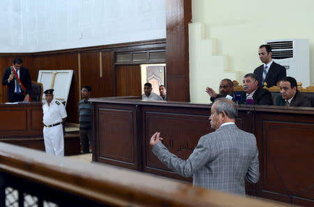 Naguib Sawiris, one of Egypt's wealthiest businessmen, testifies during the retrial of Al-Jazeera television journalists at a court in Cairo, April 22, 2015. REUTERS/Shadi Bushra