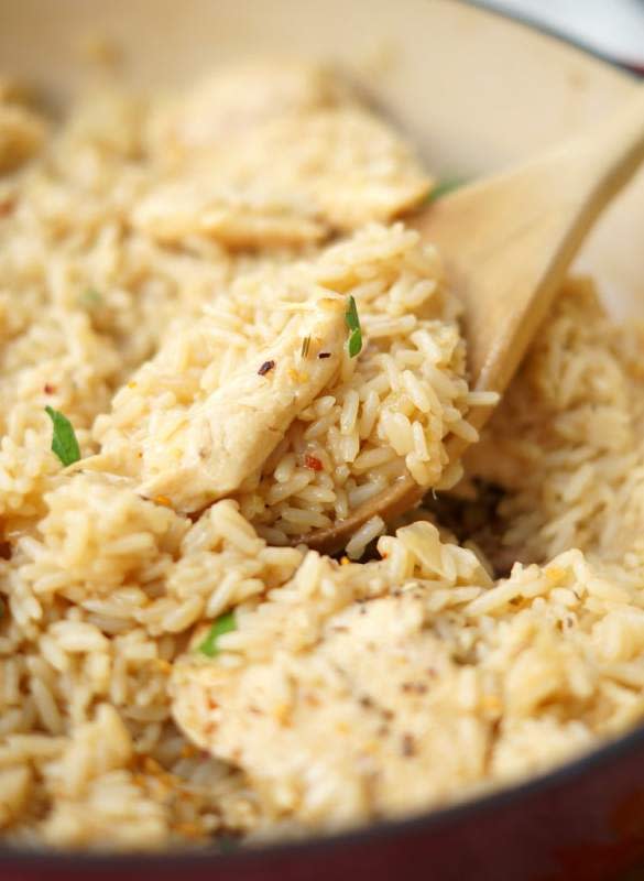 <p>Yellow Bliss Road</p><p>Skillet garlic chicken and rice casserole is a simple go-to chicken dinner that is flavorful, and only uses one pan!</p><p><strong>Get the recipe: <a href="https://www.yellowblissroad.com/skillet-garlic-chicken-rice-casserole/" rel="nofollow noopener" target="_blank" data-ylk="slk:Skillet Garlic Chicken and Rice Casserole;elm:context_link;itc:0;sec:content-canvas" class="link rapid-noclick-resp">Skillet Garlic Chicken and Rice Casserole</a></strong></p>