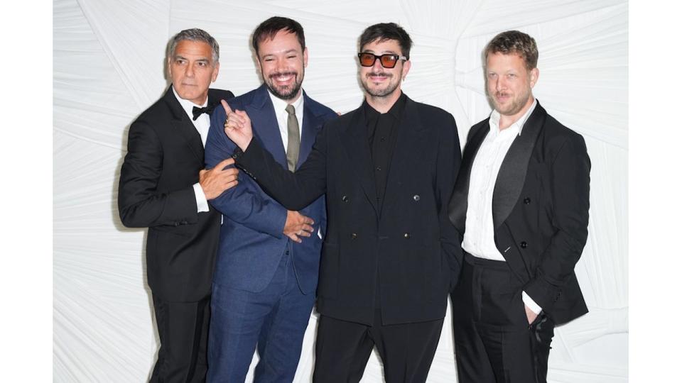 George Clooney with Ben Lovett, Marcus Mumford, Ted Dwane of Mumford and Sons 