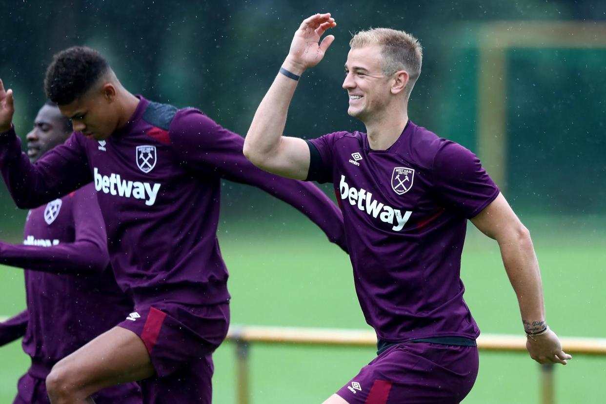 Hart was all smiles as he joined his new West Ham team-mates in Germany: West Ham United via Getty Images