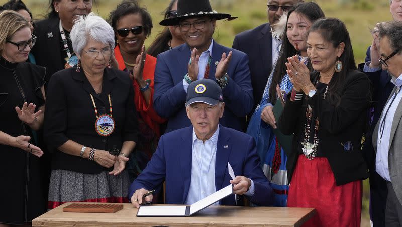 President Joe Biden holds a proclamation designating the Baaj Nwaavjo I’Tah Kukveni National Monument at the Red Butte Airfield on Tuesday, Aug. 8, 2023, in Tusayan, Ariz.