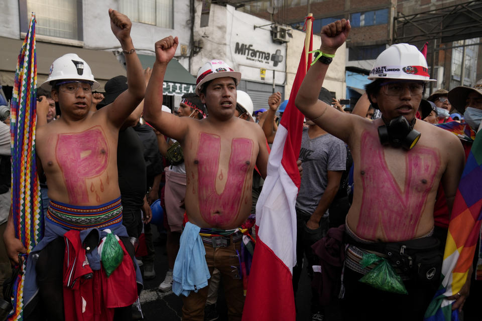 Anti-government demonstrators march in Lima, Peru, Friday, Jan. 20, 2023. Protesters are seeking immediate elections, the resignation of President Dina Boluarte, the release from prison of ousted President Pedro Castillo and justice for demonstrators killed in clashes with police. (AP Photo/Martin Mejia)