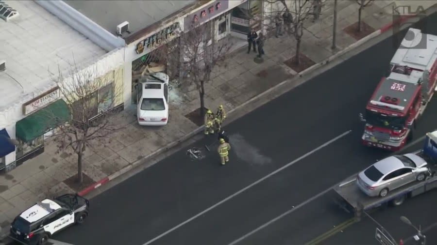 Car smashes into building after multi-vehicle collision in San Gabriel 