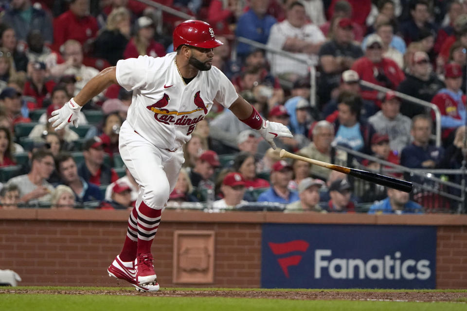 St. Louis Cardinals' Albert Pujols singles during the fourth inning of a baseball game against the Arizona Diamondbacks Friday, April 29, 2022, in St. Louis. (AP Photo/Jeff Roberson)