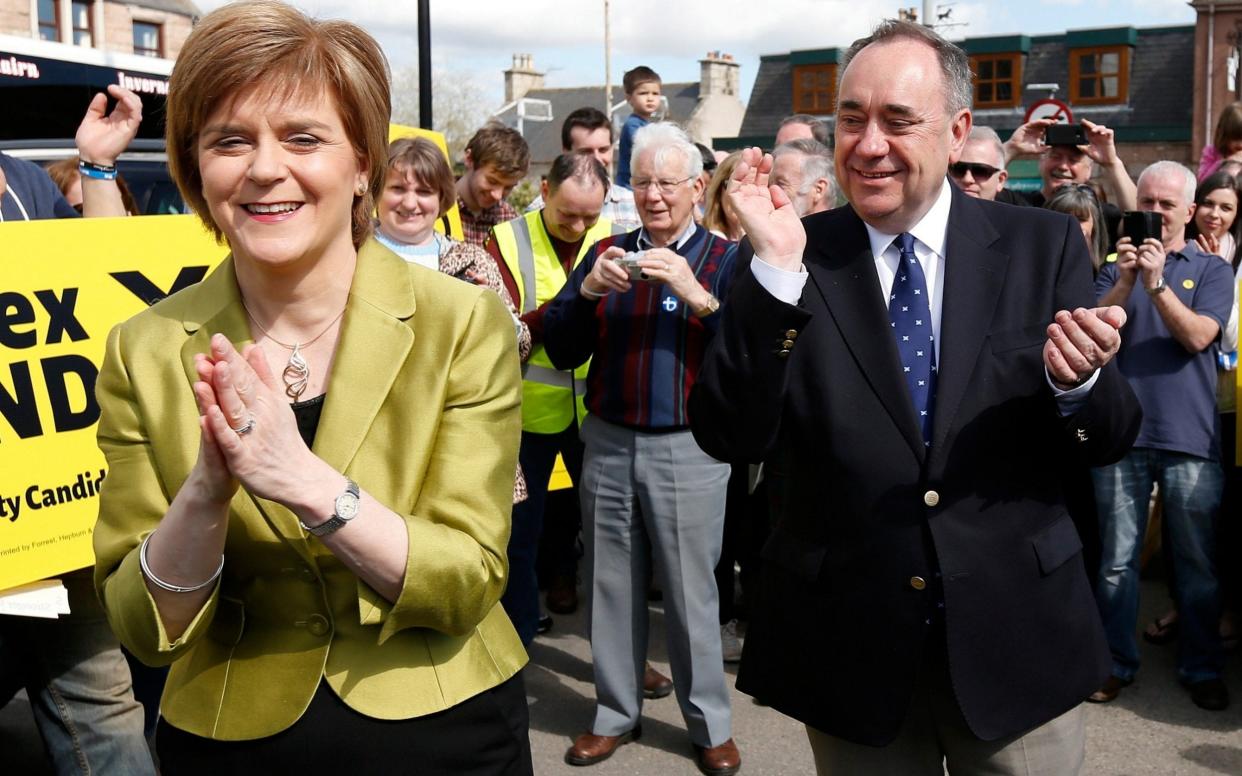 Nicola Sturgeon with Alex Salmond on the 2015 general election trail - Reuters