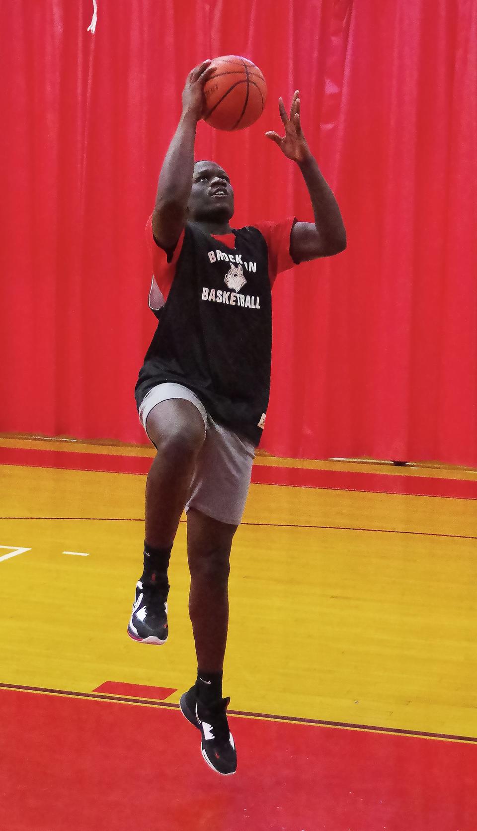 Co-captain John Francois of the Brockton Boxers goes up for a layup after getting a pass from a teammate during opening day basketball practice on Wednesday, Dec. 6, 2023.