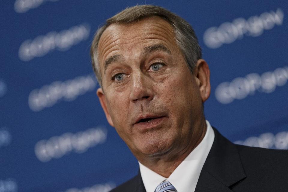 House Speaker John Boehner of Ohio meets with reporters on Capitol Hill in Washington, Wednesday, Feb. 26, 2014, following a Republican caucus. When asked about House Ways and Means Committee Chairman Rep. Dave Camp, R-Mich., and his plan to release a rewrite of the nation’s tax code later today, Boehner distanced himself from the details and wouldn't promise a House vote on the plan this year. (AP Photo/J. Scott Applewhite)