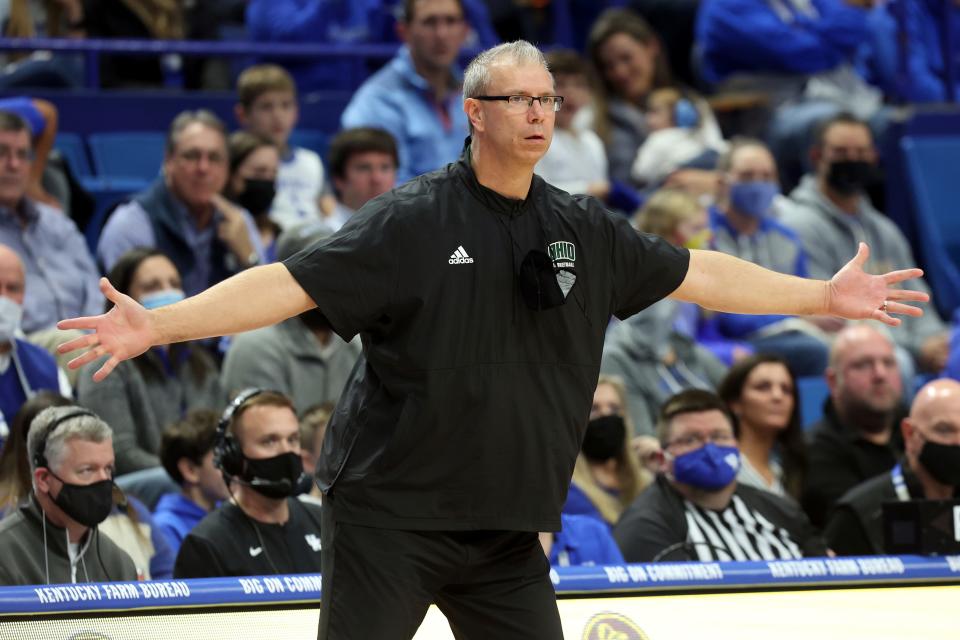 Ohio coach Jeff Boals directs the team during the first half of an NCAA college basketball game against Kentucky in Lexington, Ky., Friday, Nov. 19, 2021. (AP Photo/James Crisp)
