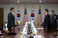 U.S. Defense Secretary Mark Esper, left, talks with South Korean Defense Minister Jeong Kyeong-doo, during their meeting Friday, Nov. 15, 2019 in Seoul, South Korea. (Chung Sung-Jun/Getty Images via AP)