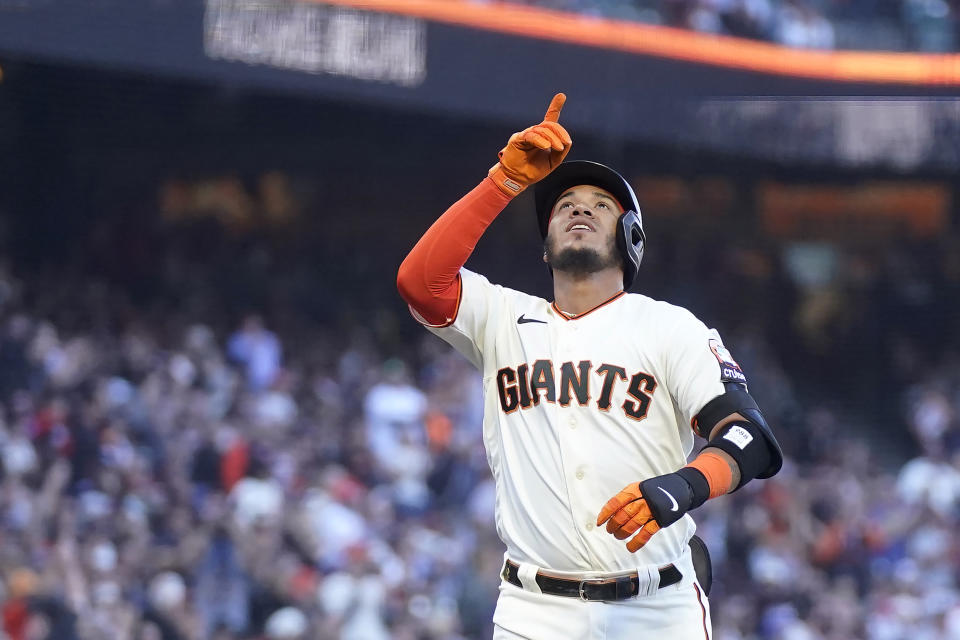 San Francisco Giants' Thairo Estrada celebrates after hitting a home run against the Colorado Rockies during the third inning of a baseball game in San Francisco, Sunday, Sept. 10, 2023. (AP Photo/Jeff Chiu)