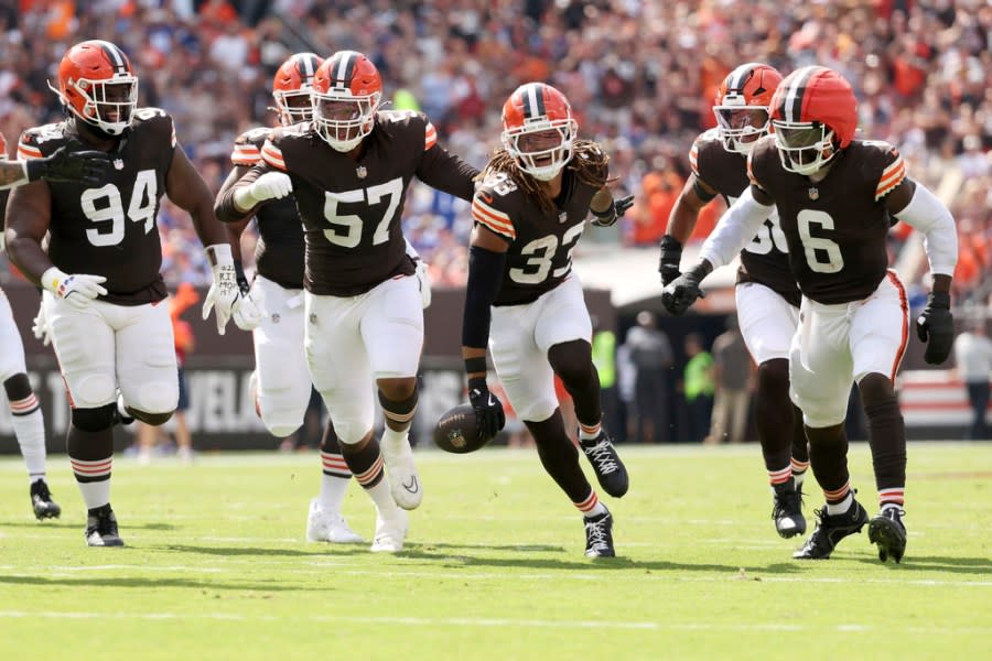 Cleveland Browns safety Ronnie Hickman (33) reacts after making an interception during an NFL football game against the New York Giants, Sunday, Sept. 22, 2024, in Cleveland. (AP Photo/Kirk Irwin)