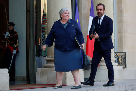 Jacqueline Gourault, newly-named French Minister of Territorial Cohesion and Relations with Local Authorities, and Sebastien Lecornu, Junior Minister of Territorial Cohesion, arrive to attend the weekly cabinet meeting at the Elysee Palace in Paris, France, October 17, 2018. REUTERS/Gonzalo Fuentes