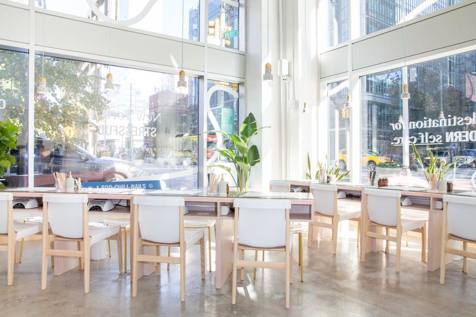 The leather sling chairs in the manicure area are so elegant and casual.