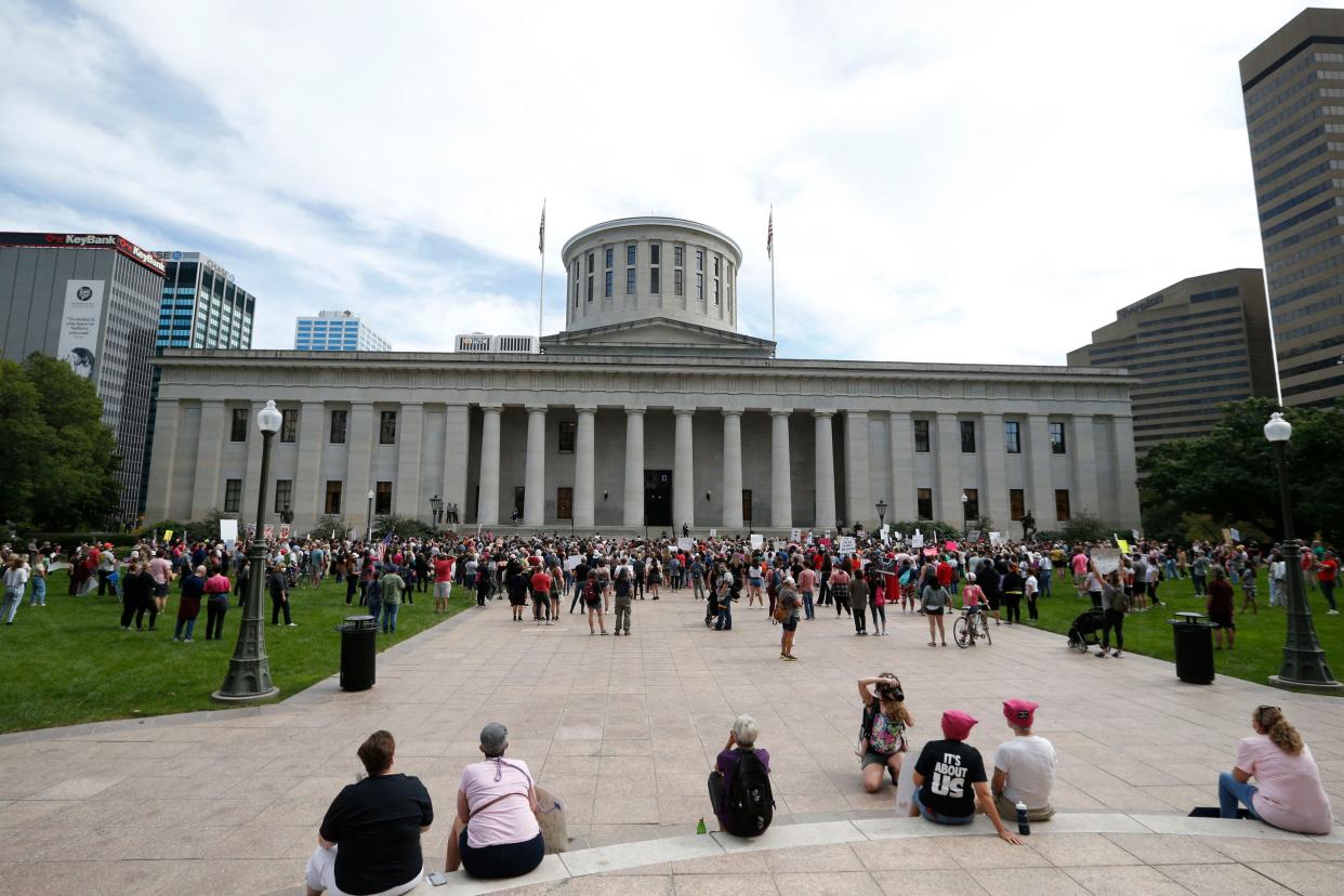 About a thousand people gather during a Women’s March held in response to the abortion ban in Texas at the Ohio State Capitol in Columbus, Ohio, on Saturday, Oct. 2, 2021. People came to speak from all different groups about women’s rights and abortion healthcare. 