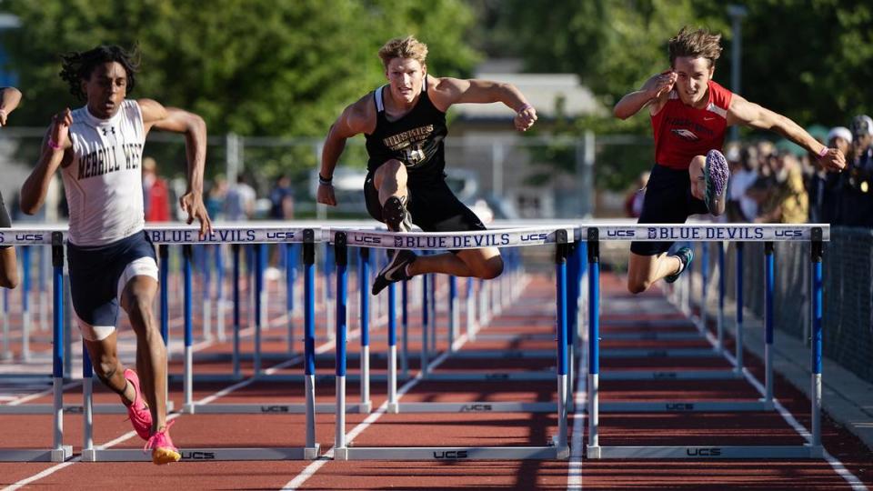 Hughson’s Larkin Meyer, middle, placed sixth in 110 meter hurdles with a time of 14.75 at the CIF Sac-Joaquin Section Masters track finals at Davis High School in Davis, Calif., Saturday, May 20, 2023. Andy Alfaro/aalfaro@modbee.com