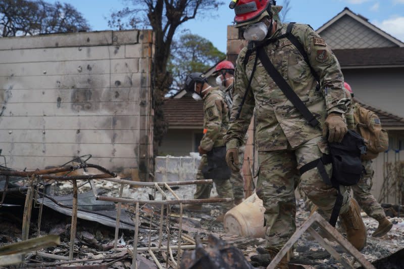 Recovery teams with cadaver dogs continued to search the ashes for human remains in Maui after the death toll in last week's wildfires rose to 96. Photo by Master Sgt. Andrew Jackson/USAF/U.S. National Guard/UPI