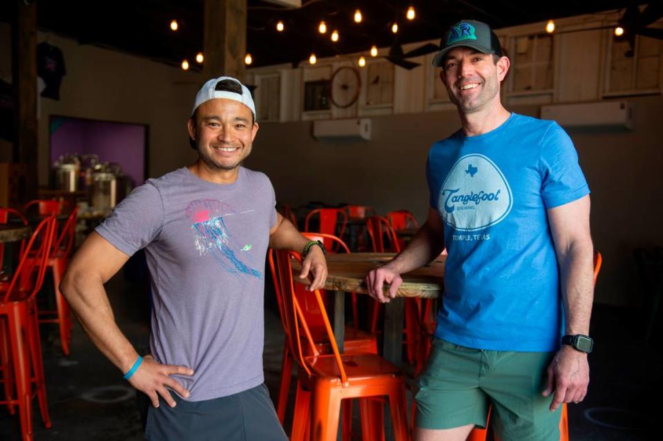 Altered Reality co-owners Mike Massey, right, and Jason Weaver pose for a portrait inside the future brewery on Howard Avenue in Biloxi on Friday, Feb. 23, 2024.