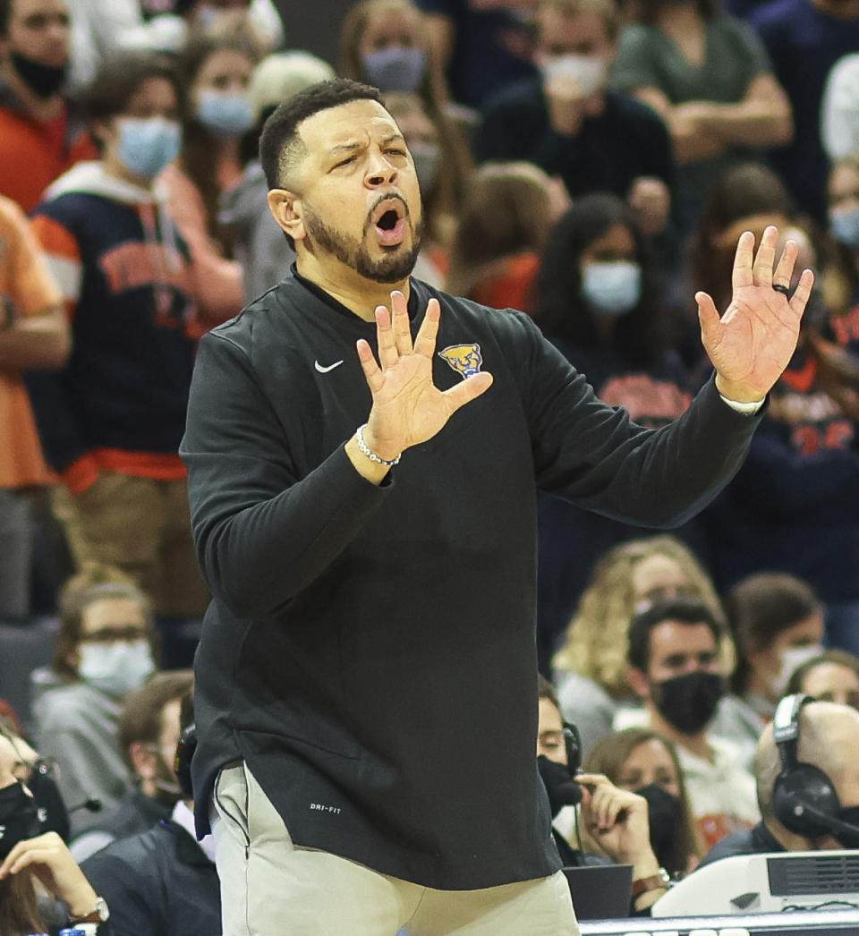 Pittsburgh head coach Jeff Capel III reacts to a play during an NCAA college basketball game against Virginia in Charlottesville, Va., Friday, Dec. 3, 2021. (AP Photo/Andrew Shurtleff)