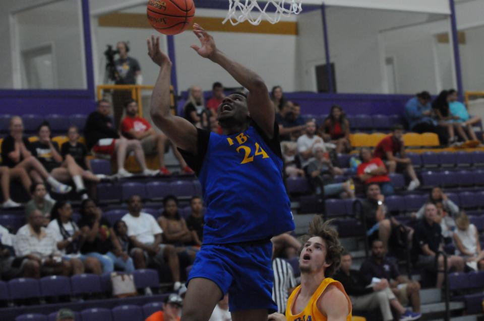 Topeka West's Elijah Brooks (24) goes up for a shot during the KBCA All-Star Game Saturday, June 18, 2022 at Mabee Arena in Salina.