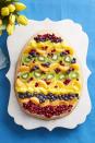 <p>Cream cheese makes layers of tropical fruits stick to this oversized egg-shaped sugar cookie base.</p><p><strong><em><a href="https://www.womansday.com/food-recipes/food-drinks/recipes/a58135/edible-easter-egg-tart-recipe/" rel="nofollow noopener" target="_blank" data-ylk="slk:Get the Edible Easter Egg Tart recipe.;elm:context_link;itc:0;sec:content-canvas" class="link ">Get the Edible Easter Egg Tart recipe.</a></em></strong> </p>