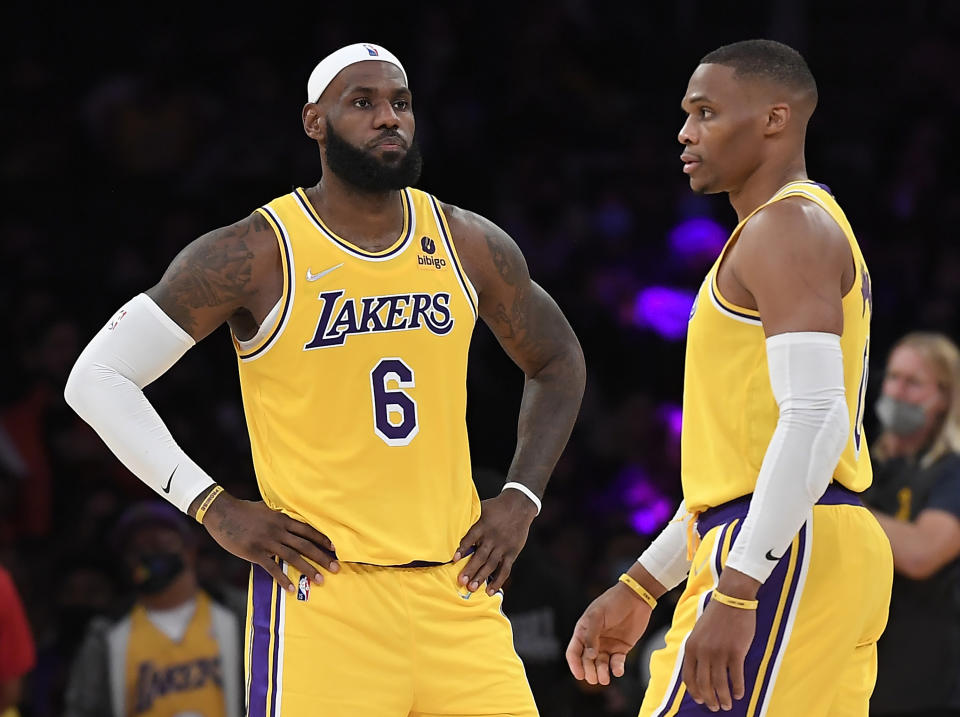 LOS ANGELES, CA - OCTOBER 12: LeBron James #6 and Russell Westbrook #0 of the Los Angeles Lakers on the basketball court together during the second half of a preseason basketball game against the Golden State Warriors at Staples Center on October 12, 2021 in Los Angeles, California. NOTE TO USER: User expressly acknowledges and agrees that, by downloading and/or using this Photograph, user is consenting to the terms and conditions of the Getty Images License Agreement. (Photo by Kevork Djansezian/Getty Images)