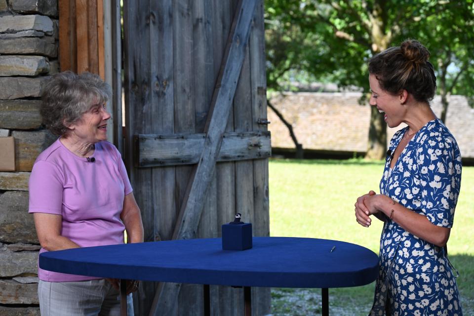 Appraiser Lucy Grogan Edwards, right, discusses an Edwardian sapphire and diamond ring during the "Antiques Roadshow" summer tour 2022 at Shelburne Museum on July 12, 2022.