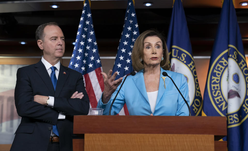 Speaker of the House Nancy Pelosi, D-Calif., is joined by House Intelligence Committee Chairman Adam Schiff, D-Calif., at a news conference as House Democrats move ahead in the impeachment inquiry of President Trump, at the Capitol in Washington this week. (Photo: J. Scott Applewhite/AP)