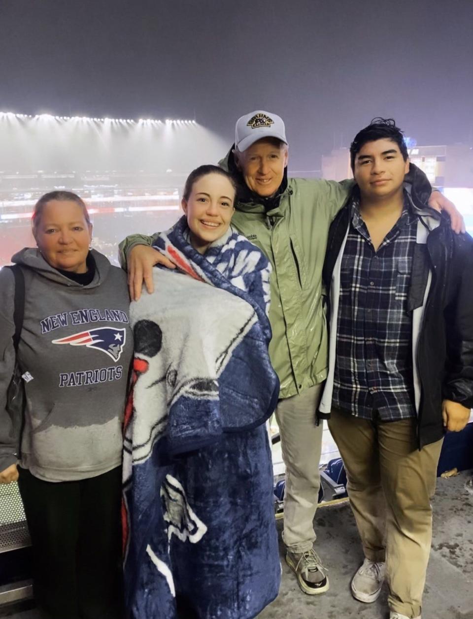 The Duffy family caught Tampa Bay Buccaneers quarterback Tom Brady's return to his old Patriots stomping ground at Gillette Stadium in Foxboro, Massachusetts, in October 2021. One year later, Kate Duffy, left, would be diagnosed with pancreatic cancer.