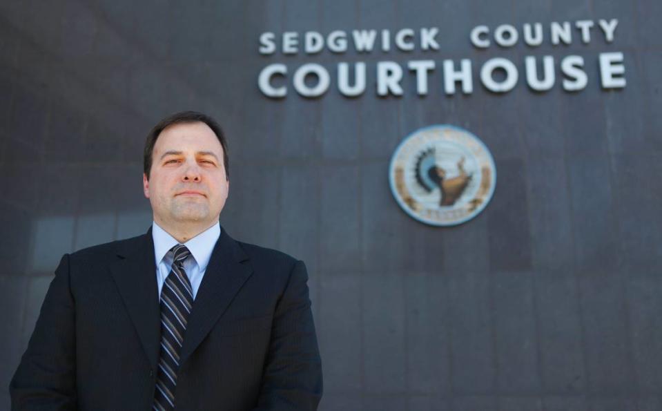 Wichita police knew about a racist photo sent by a white officer for nearly a year before they told Sedgwick County District Attorney Marc Bennett’s office.