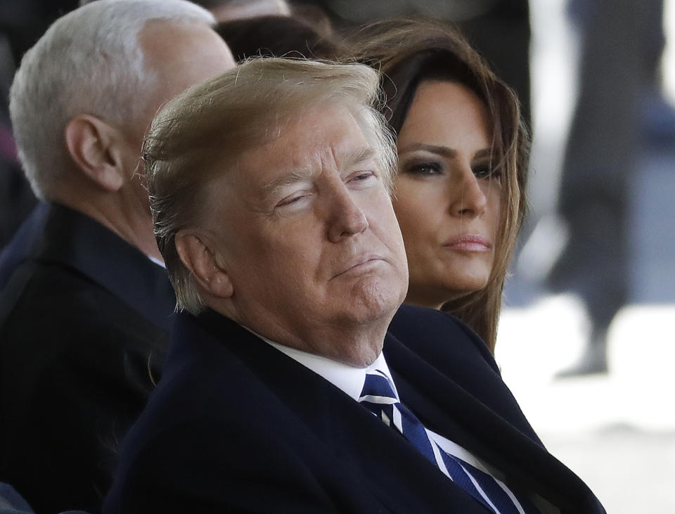 President Trump and first lady Melania Trump listen at a funeral service for the Rev. Billy Graham in Charlotte, N.C., on March 2, 2018. (Photo: Chuck Burton/AP)