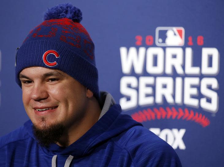 Kyle Schwarber smiles as he answers a question during a news conference for Game 3 of the MLB World Series. (AP)