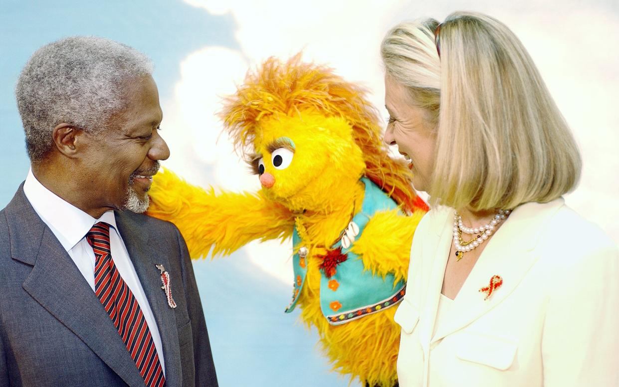 Annan – then UN secretary general – and his wife Nane do a skit with an HIV-positive Muppet on the South African version of Sesame Street - UN Photo/Evan Schneider