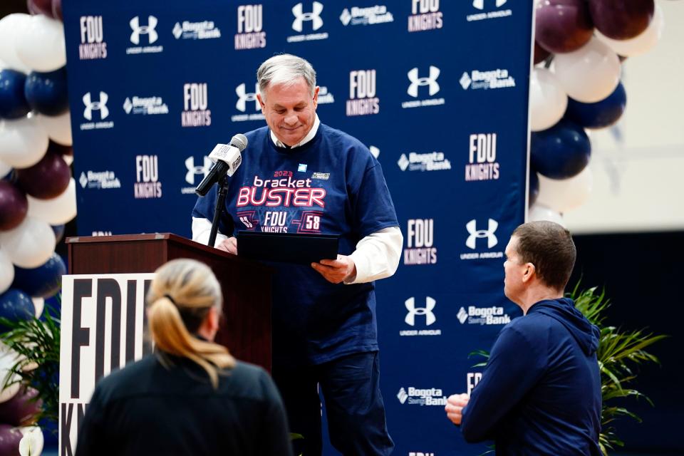 Bergen County Executive Jim Tedesco gives women's head coach Angelika Szumilo and men's head coach Tobin Anderson proclamations from the county during the celebration held by Fairleigh Dickinson University for the historic 2022-23 seasons of the KnightsÕ'men's and women's basketball teams in Hackensack on March 27, 2023.