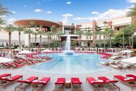 Not quite into the relentless crowds of The Strip? The <a href="https://www.cntraveler.com/hotels/united-states/las-vegas/red-rock-casino-resort-spa?mbid=synd_yahoo_rss" rel="nofollow noopener" target="_blank" data-ylk="slk:Red Rock Las Vegas;elm:context_link;itc:0;sec:content-canvas" class="link ">Red Rock Las Vegas</a> pools offer a respite from the wild scene but with all the amenities and comforts you’d want to have poolside. The main pool is simple in layout but still has 19 private cabanas and poolside gaming, along with specialty cocktails and all-day food from the Sandbar Grille (there’s even a Dole Whip on the menu.) For adults, the Rouge Room is a 21 and up private pool with cabanas and lounge seating that makes it one of the most intimate pool scenes in Las Vegas.