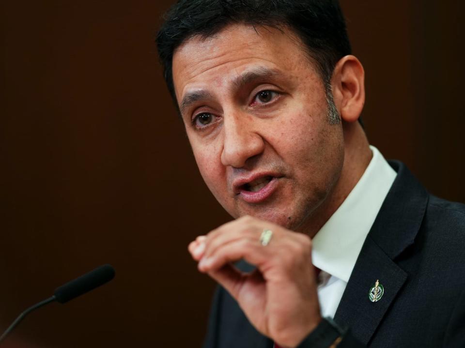 Arif Virani, Minister of Justice, and Attorney General of Canada, speaks during a press conference on Parliament Hill in Ottawa regarding the new online harms bill on Monday, Feb. 26, 2024.