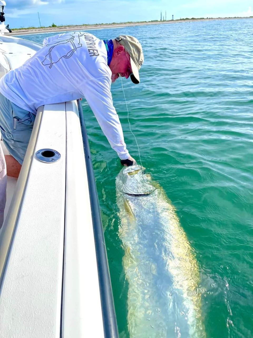 A client of Capt. Jon Lulay's enjoyed catching and releasing tarpon off the beach on Aug. 22, 2022.