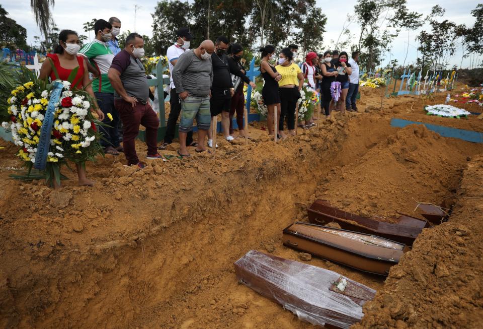 A collective burial of people that have passed away due to the coronavirus disease (COVID 19), is seen at the Parque Taruma cemetery in Manaus, Brazil April 23, 2020..JPG