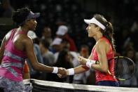 Mar 30, 2017; Miami, FL, USA; Johanna Konta of Great Britain shakes hands with Venus Williams of the United States (left) after their match in a women's singles semi-final during the 2017 Miami Open at Crandon Park Tennis Center. Konta won 6-4, 7-5. Mandatory Credit: Geoff Burke-USA TODAY Sports