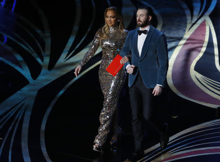 91st Academy Awards - Oscars Show - Hollywood, Los Angeles, California, U.S., February 24, 2019. Jennifer Lopez and Chris Evans present for production design. REUTERS/Mike Blake