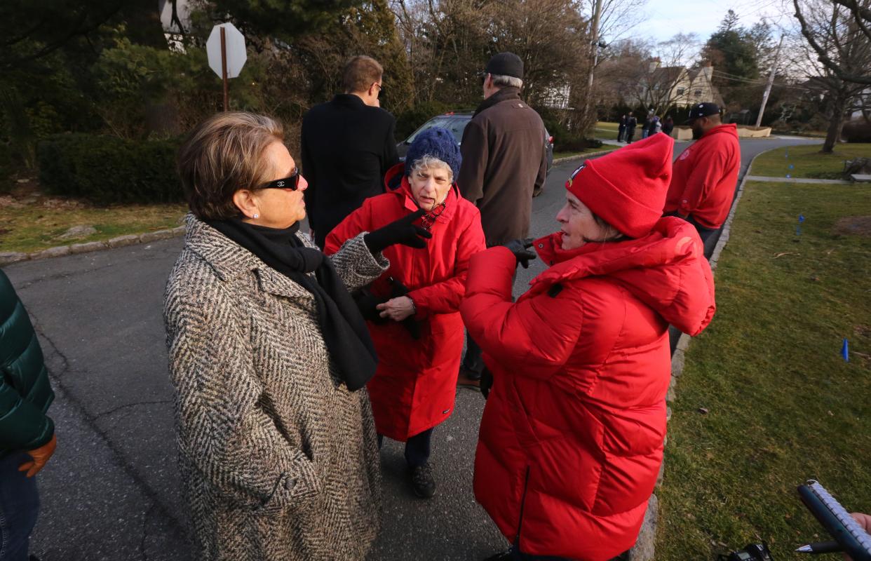 Marguerite Pisano, left, and Susan Rosenzweig, both of Mount Vernon and Betsy Harding of Bronxville talk at the site of a planned flood control project in Bronxville March 1, 2024. They are concerned that the project will cause flooding in their neighborhoods.